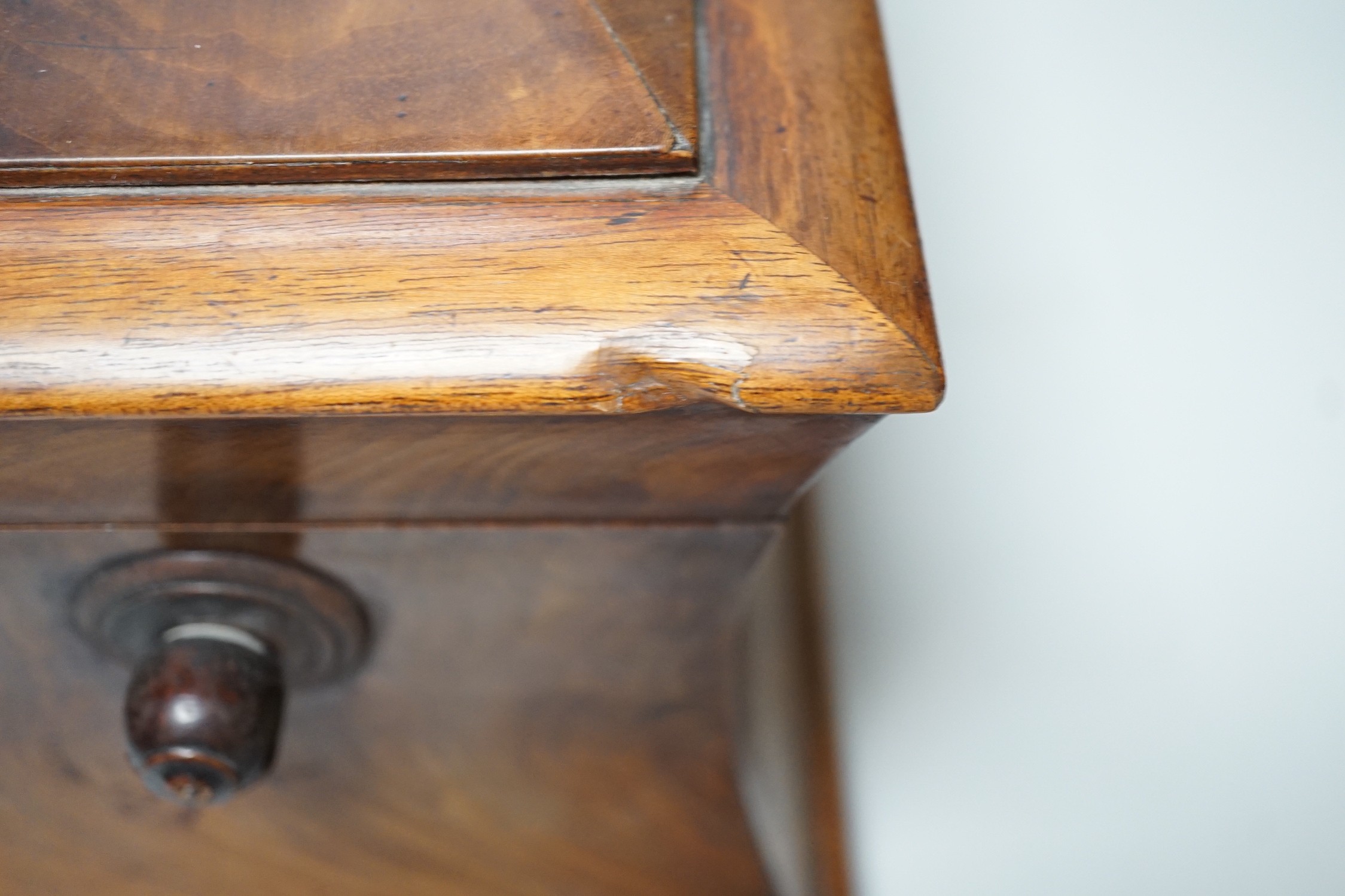 A 19th century mahogany sarcophagus shaped tea caddy, 34cm wide